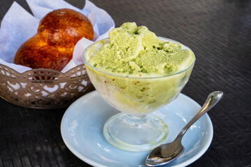 Sicilian pistachio granita with almond brioche: Traditional Italian summer dessert
