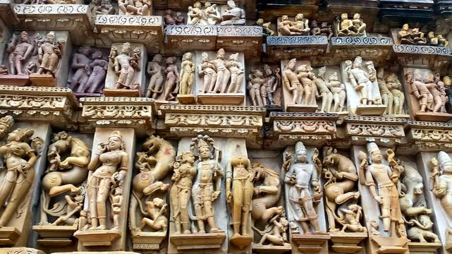 Sculptures on the wall of bhagawan parshwanath digambar jain mandir in khajuraho, madhya pradesh, India.Unesco world heritage site.