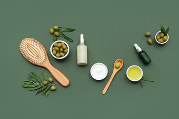 Composition with essential oil, ingredients for natural cosmetics and hair brush on color background