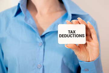 Tax deductions text on the page. on the envelope.