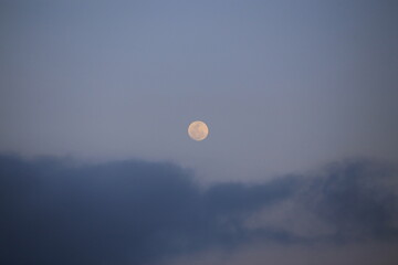 moon over the clouds