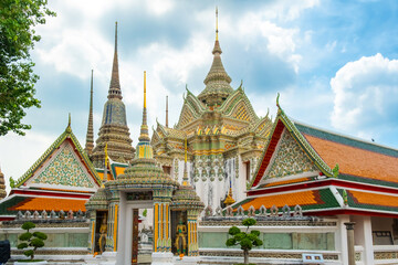 Naklejka premium Wat Pho Temple Complex in Bangkok city with traditional Thai Buddhist architecture in Thailand, Asia. Phra Mondop of Temple of the Reclining Buddha. Popular tourist landmark