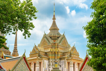 Ornate Wat Pho Thai Temple in Bangkok city with traditional Buddhist architecture in Thailand,...