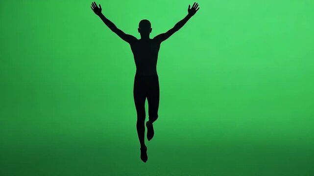 3d rendered silhouette of a man floating with arms outstretched against a green screen background, ideal for compositing and visual effects