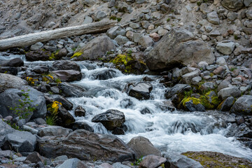 Water Tumbles Over Rocks Below Bridge in West Fork Van Trump Creek