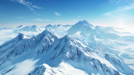 Obraz premium Aerial view of a snow-capped mountain range with a clear blue sky.