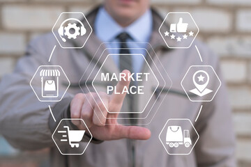 Businessman using virtual touch screen presses inscription: MARKETPLACE. Online marketplace e-commerce internet shopping business concept. Market place online store web navigation shopping technology.