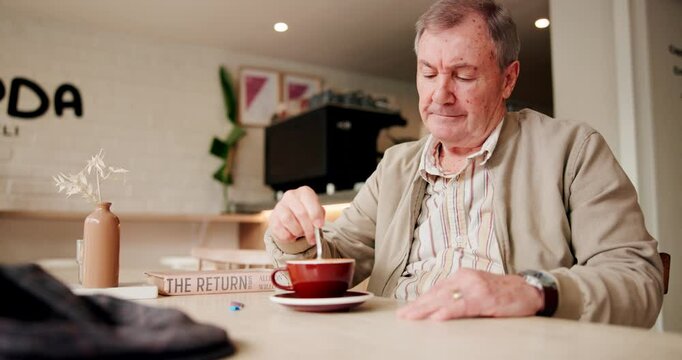 Senior, man and sad with coffee in cafe for break, lonely and unhappy with nostalgia in retirement. Elderly, customer and stir cappuccino in bistro with thinking, remember and reflection of memory