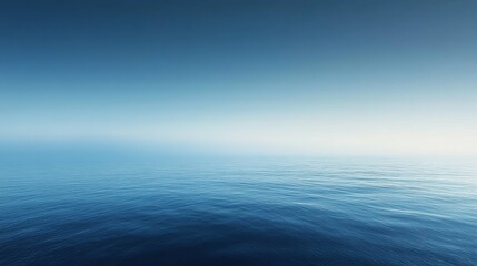 Obraz premium Calm Ocean Surface Under a Clear Blue Sky