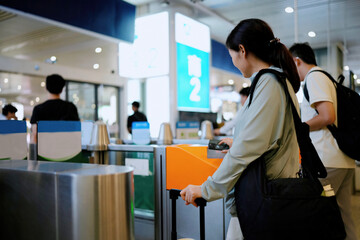 Commuters Navigating a Modern Transit System at a Busy Station