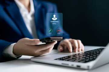 Businesswomen use s smartphone with incoming call from unknown number, spam, prank caller, hoax person, fake identity, scammer, scam with mobile phone, hacker, Call center gang, crime, phishing.