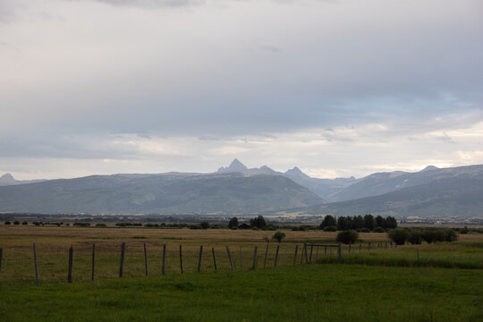 Landscape photo with mountains and clouds. Located in Victor Idaho view of The Grand Teton Mountains.