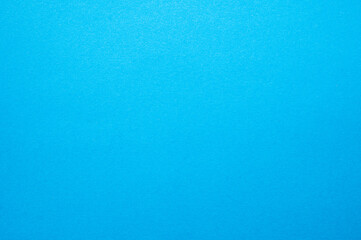 Full frame shot of blue paper sheet texture and background. Colored paper or construction paper, is a type of paper that comes in a wide range of colors.