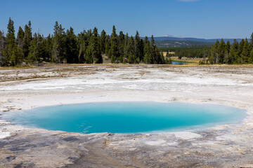 Photo of Yellowstone National Park thermal feature, opal pool fountain geyser located in Wyoming.