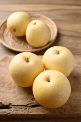 Asian pear fruit on wooden background, Sweet and juicy fruit