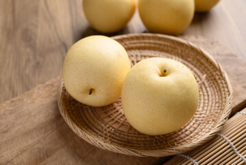 Asian pear fruit on wooden background, Sweet and juicy fruit