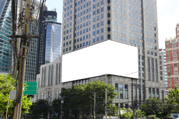 Mockup image of Blank billboard white screen posters and led outside building for advertising,...