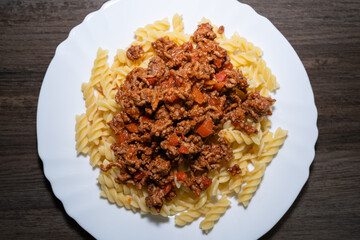 Cooked pasta with bolognese sauce