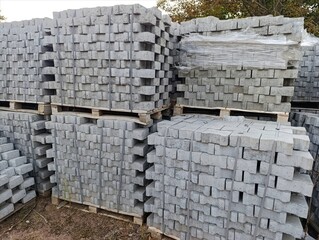 A pile of concrete blocks stacked on top of each other