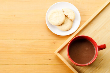 Cup of delicious hot chocolate, Cookies on wooden table background. Copy space. Flat lay. Top view.