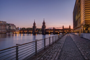 The Oberbaumbruecke over the river Spree in Berlin after sunset
