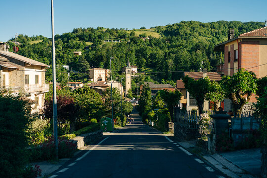 Sentiero degli Dei. Village and wind wind turbine along the Path of the Gods. San Benedetto val di Sambro, Bologna Province, Emilia Romagna, Italy.