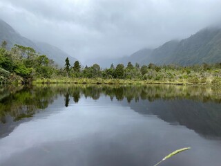 Peters Pool at Franz Josef Grecier, west coast, South Island, New Zealand, lake in the mountains