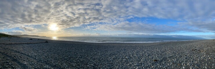 Panoramic views of the stunning sunset sky on the beach
