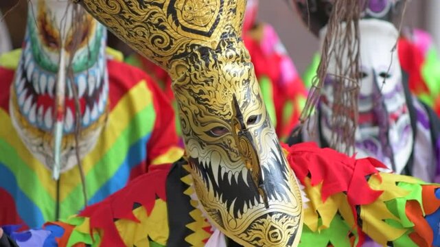 The ghost festival or (Phi ta khon) in north eastern Thai. In this traditional festival, people will join by wearing the colorful creative in spirit clothing design and dance around the city.