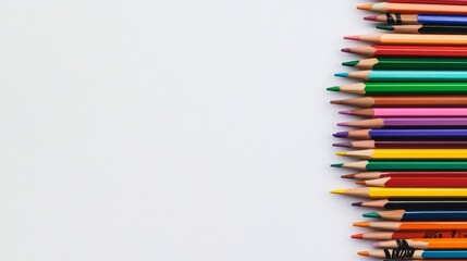 Vibrant Drawing Pencils Arranged Neatly on White Background with Copy Space on the Right Side