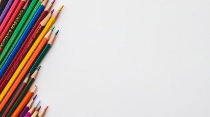 Vibrant Drawing Pencils Arranged Neatly on White Background with Space for Text on the Right Side