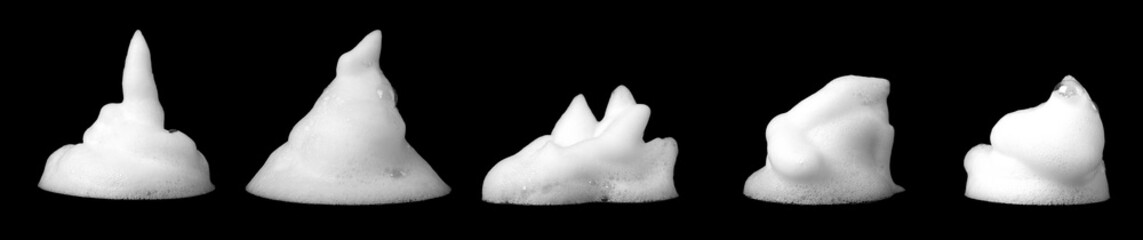 Abstract soap bubbles. Set of soap bubbles. Shampoo or shower gel. Isolated soap bubbles on black background with texture and contrast background.
