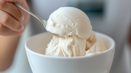 A person scooping ice cream into a bowl with a spoon, AI