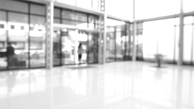 Blurred of office building and employees walking into work.