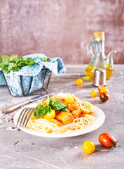 Pasta in white plate on light background. Bolognese sauce is classic italian cuisine dish. Popular italian food.