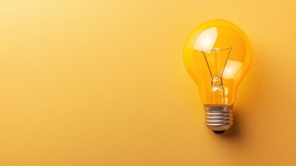 Yellow Lightbulb on Yellow Background