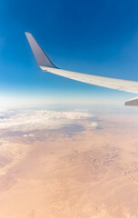 Obraz premium Aerial view on arabian desert and Red sea mountains from airplane