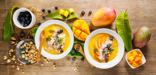 Top View of Smoothie Bowl with Mango, Blueberry, and Coconut – Healthy Breakfast
