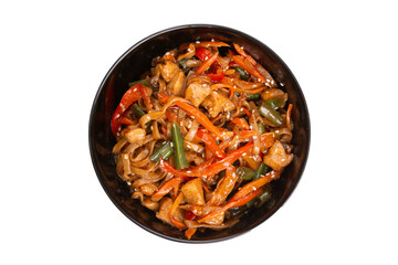 Savory wok noodles with vegetables and meat on a black plate