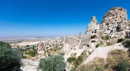 The view of the ancient cave city and fortress Uchisar, Cappadocia, Turkey