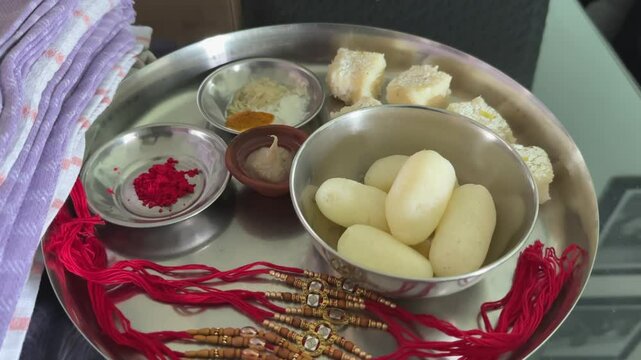 Push in shot of a Rakhi thaali showing prepration for Rakhi The indian traditional festival of brother and sister