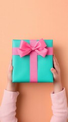 A child receiving a Diwali gift wrapped in bright paper with a bow, child, Diwali gift, bow