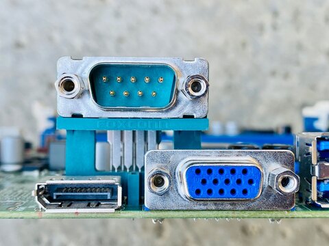 Serial, VGA and DVI ports on a classic computer motherboard.