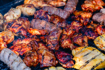 grilled meat over the coals on barbecue