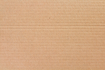 Cardboard sheet texture background, detail of recycle brown paper box pattern.