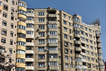 Worn out apartment building from the communist era. Traditional communist housing ensemble
