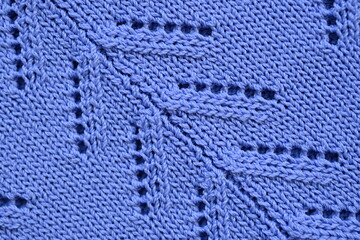 line texture symmetrical pattern, macro texture of cotton purple crochet sweater as background,...