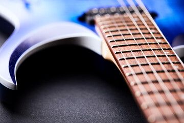 Fototapeta premium Fretboard of modern electric guitar. Close up. 