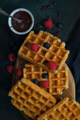 Belgian waffles on a dark background