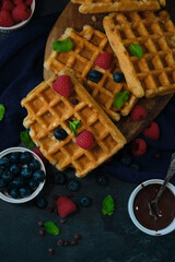 Belgian waffles on a dark background